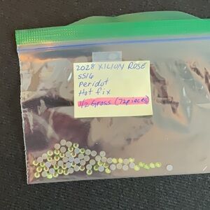 Swarovski • Color: Peridot, 2028 XILION Rose Hotfix Rhinestones